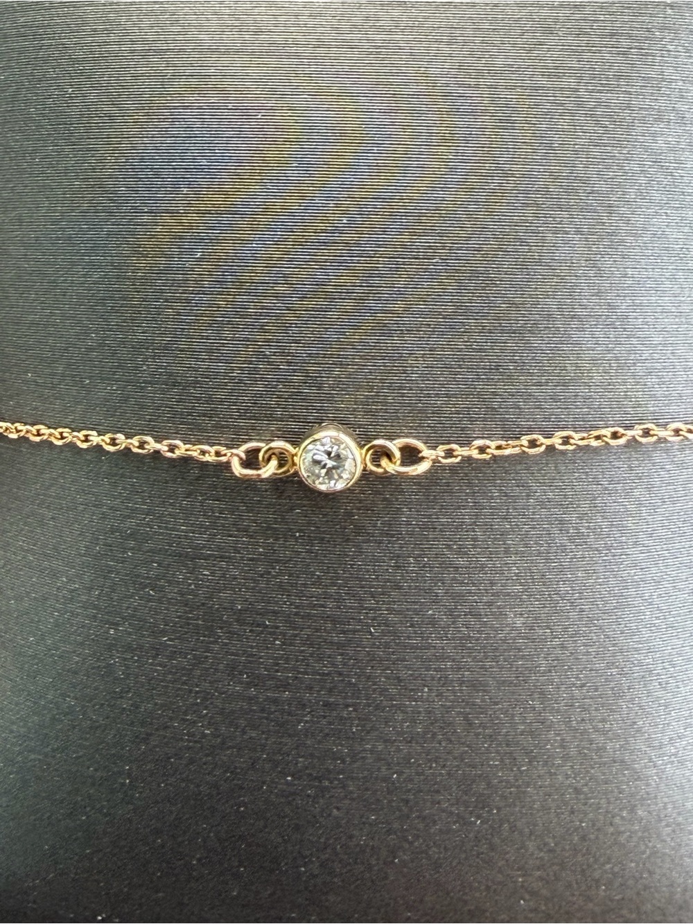 Delicate 14kt. Yellow Gold Chain Bracelet with Single Diamond in bezel.